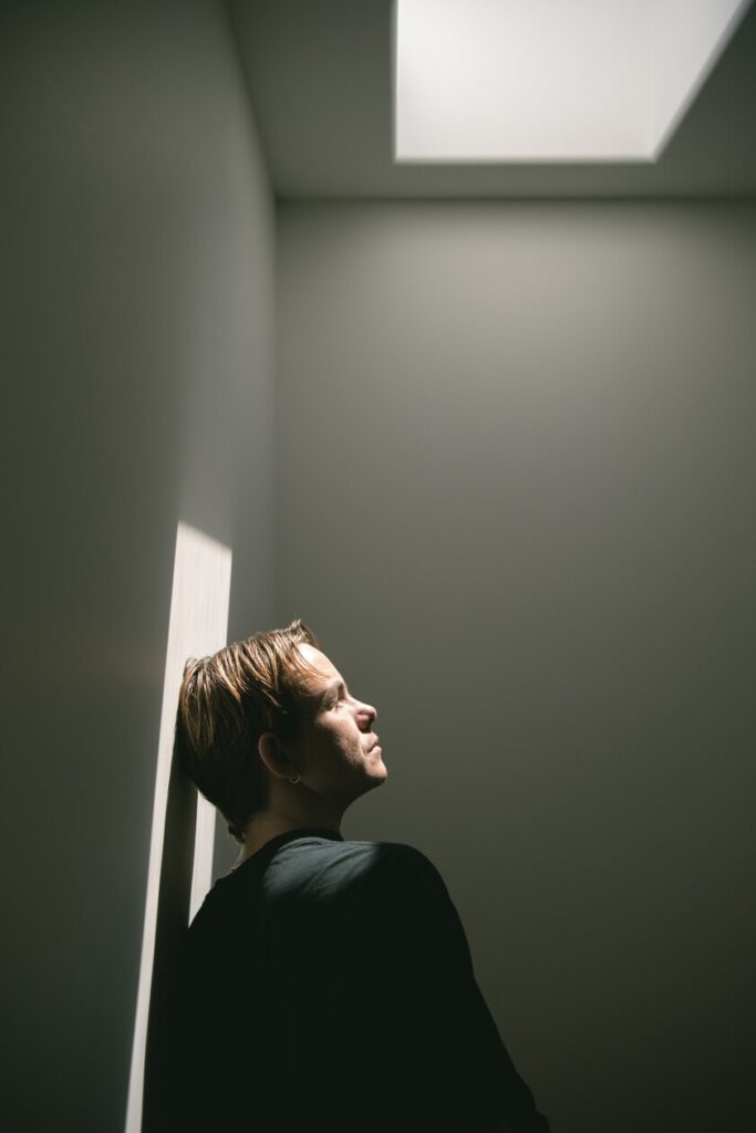 a man standing in a hallway