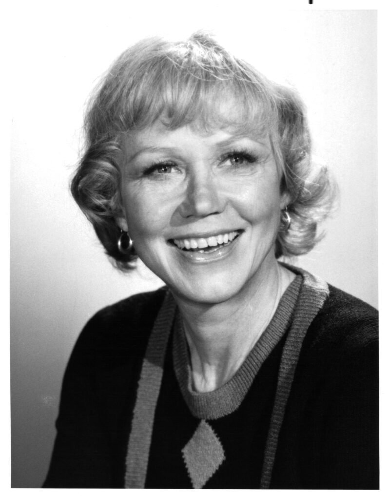Black and white portrait of actress Audra Lindley smiling