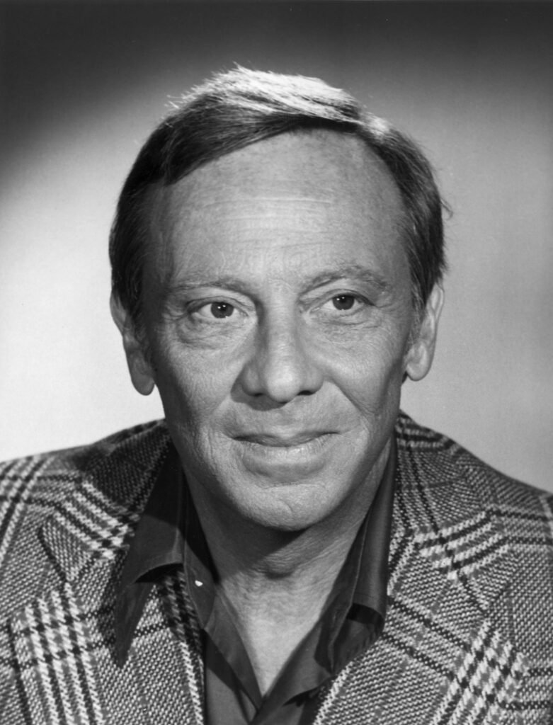 Black and white image of actor Norman Fell smiling
