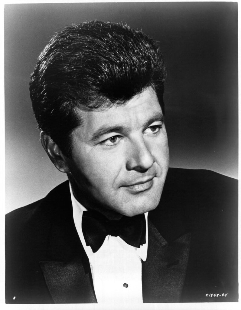 Black and white portrait of actor Dick Shawn looking to the side
