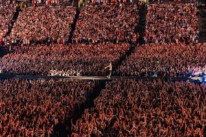 Chris Martin in the middle of ‘90,000 bouncing souls’ at Wembley.
