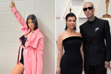 Kourtney Kardashian hides her stomach in baggy pink coat amid pregnancy rumors 