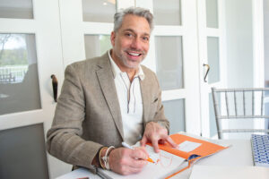 Thom Filicia signs copies of his book at the Maplewood Country Club on May 5, 2022, in Maplewood, New Jersey
