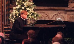 Elton John singing Candle in the Wind at the funeral of Princess Diana in 1997.