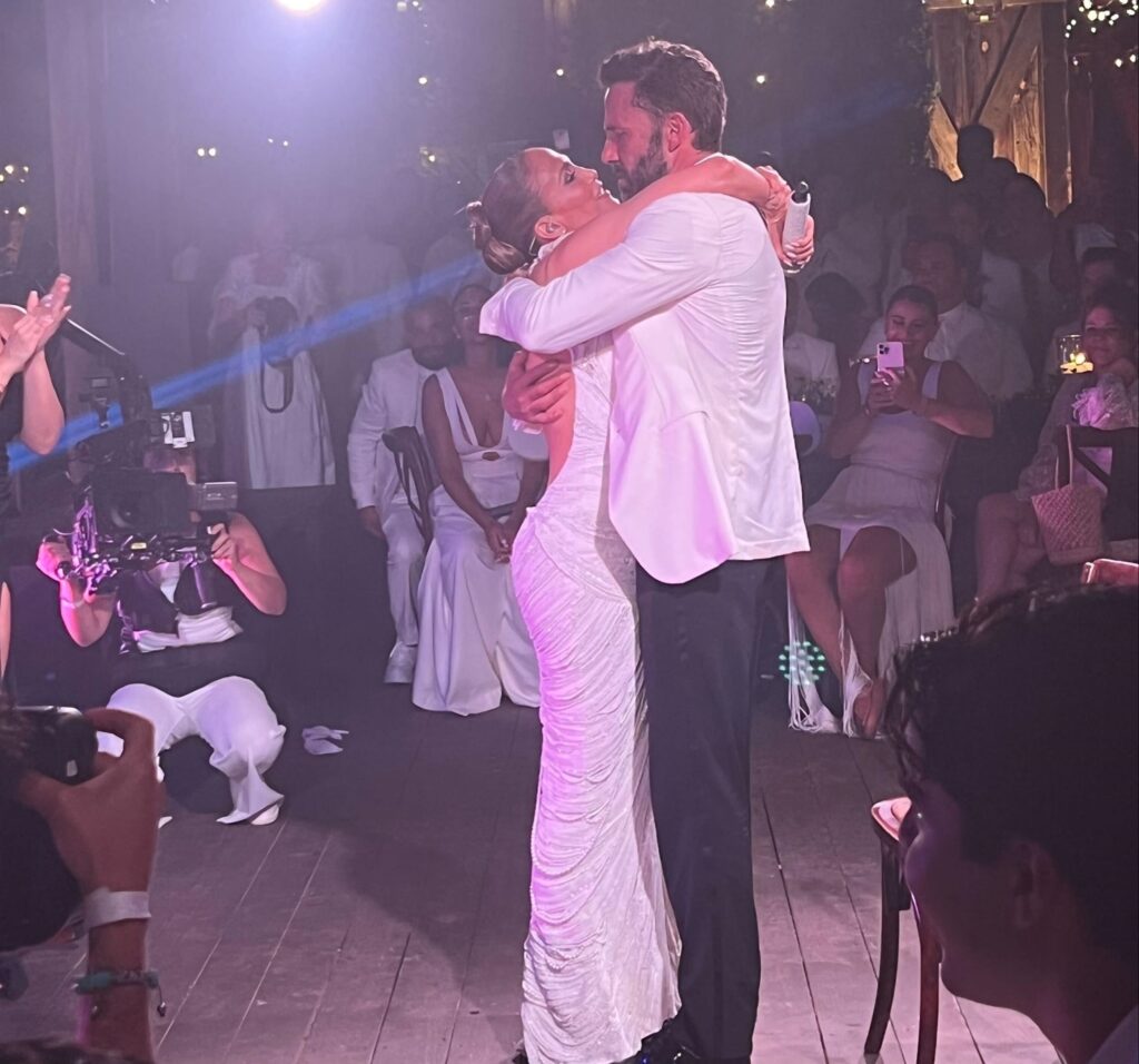Jennifer Lopez and Ben Affleck embrace at their lavish wedding reception
