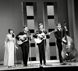 The Seekers perform on the UK TV show Sunday Night at the London Palladium in 1966.