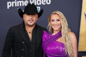 Jason (left) and Brittany Aldean.