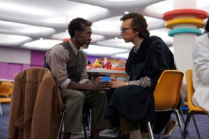 (L-R) Don Cheadle and Adam Driver as Murray and Jack in White Noise.