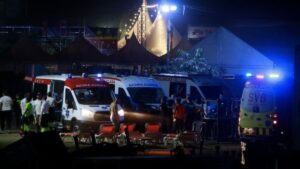 One Person Killed, Dozens Injured After Stage Collapse