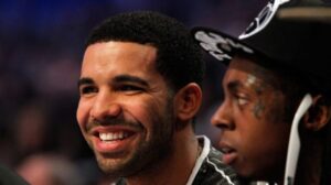 Social Media Reacts To Seeing Drake Troll His Dad's Tattoo