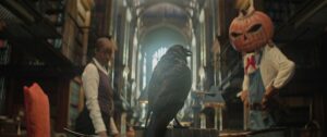 Matthew the Raven in the foreground talking to Merv and Lucienne in the Dreaming’s library