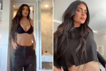 Kylie Jenner shows off bare belly & thin waist in sexy shirtless video