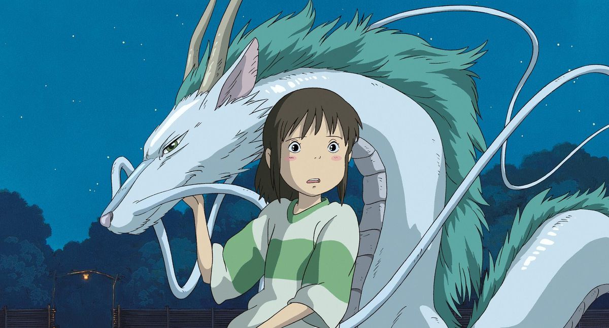 a young girl and a water dragon gasp at something off-screen in Spirited Away