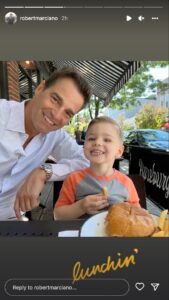 Rob Marciano smiles next to his son during a lunch date