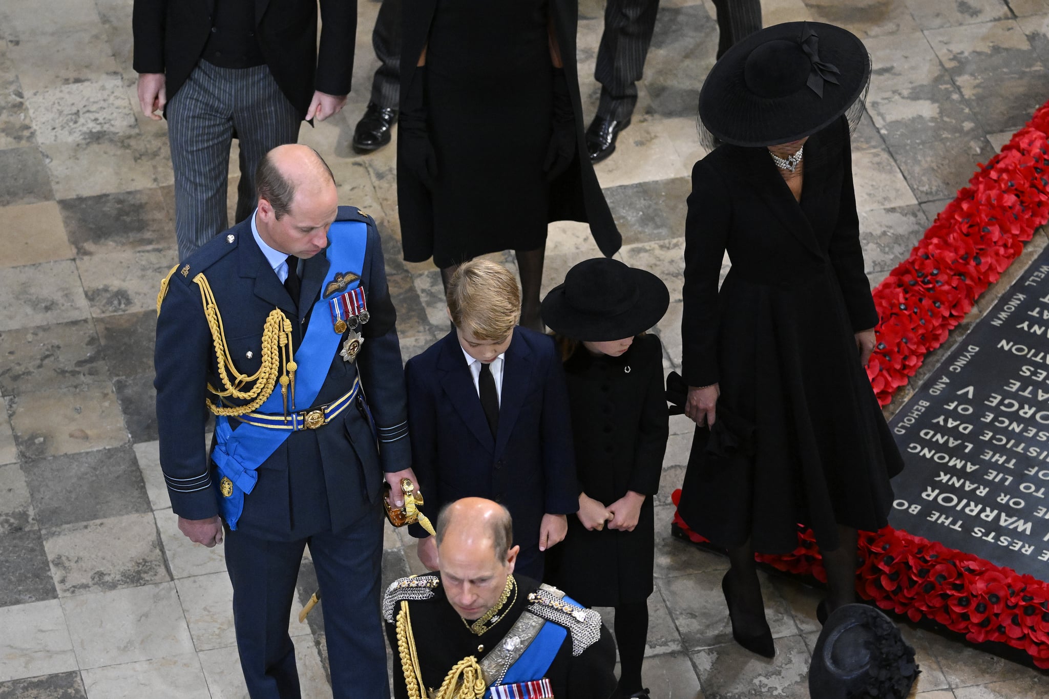 LONDON, ENGLAND - SEPTEMBER 19: William, Prince of Wales, Prince George of Wales, Princess Charlotte of Wales and Catherine, Princess of Wales departing Westminster Abbey during the State Funeral of Queen Elizabeth II on September 19, 2022 in London, England. Elizabeth Alexandra Mary Windsor was born in Bruton Street, Mayfair, London on 21 April 1926. She married Prince Philip in 1947 and ascended the throne of the United Kingdom and Commonwealth on 6 February 1952 after the death of her Father, King George VI. Queen Elizabeth II died at Balmoral Castle in Scotland on September 8, 2022, and is succeeded by her eldest son, King Charles III.  (Photo by Gareth Cattermole/Getty Images)