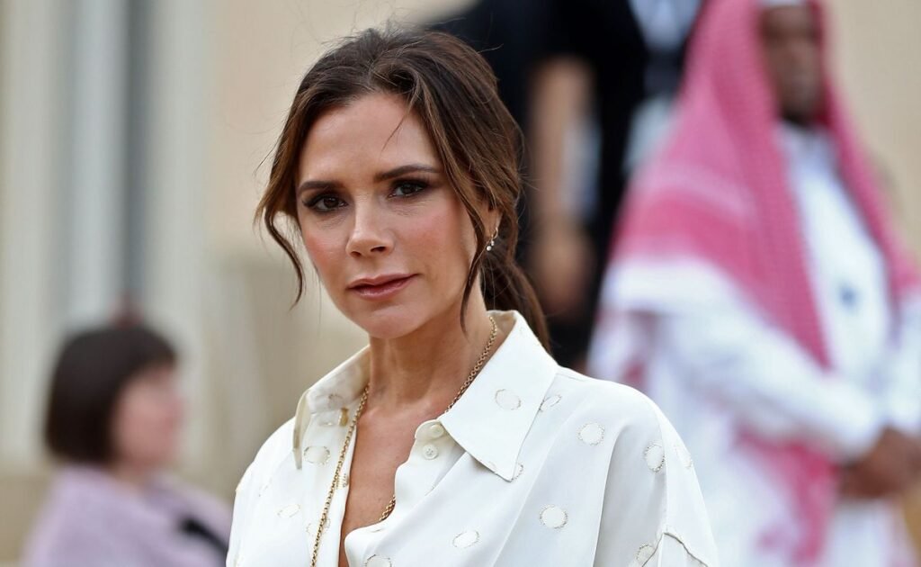 Victoria Beckham in a white blouse