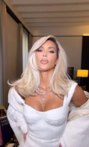 Kim Kardashian showed off her ever-shrinking waist by modeling another Dolce & Gabbana dress