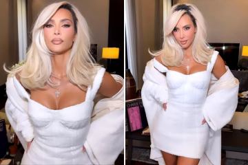 Kim shows off her tiny waist in a tight white dress after major weight loss