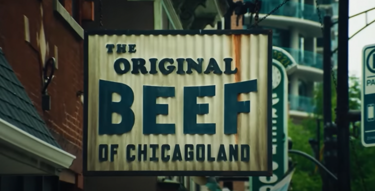 Old rusted corrugated iron entrance sign for the Original Beef Sandwich shop 