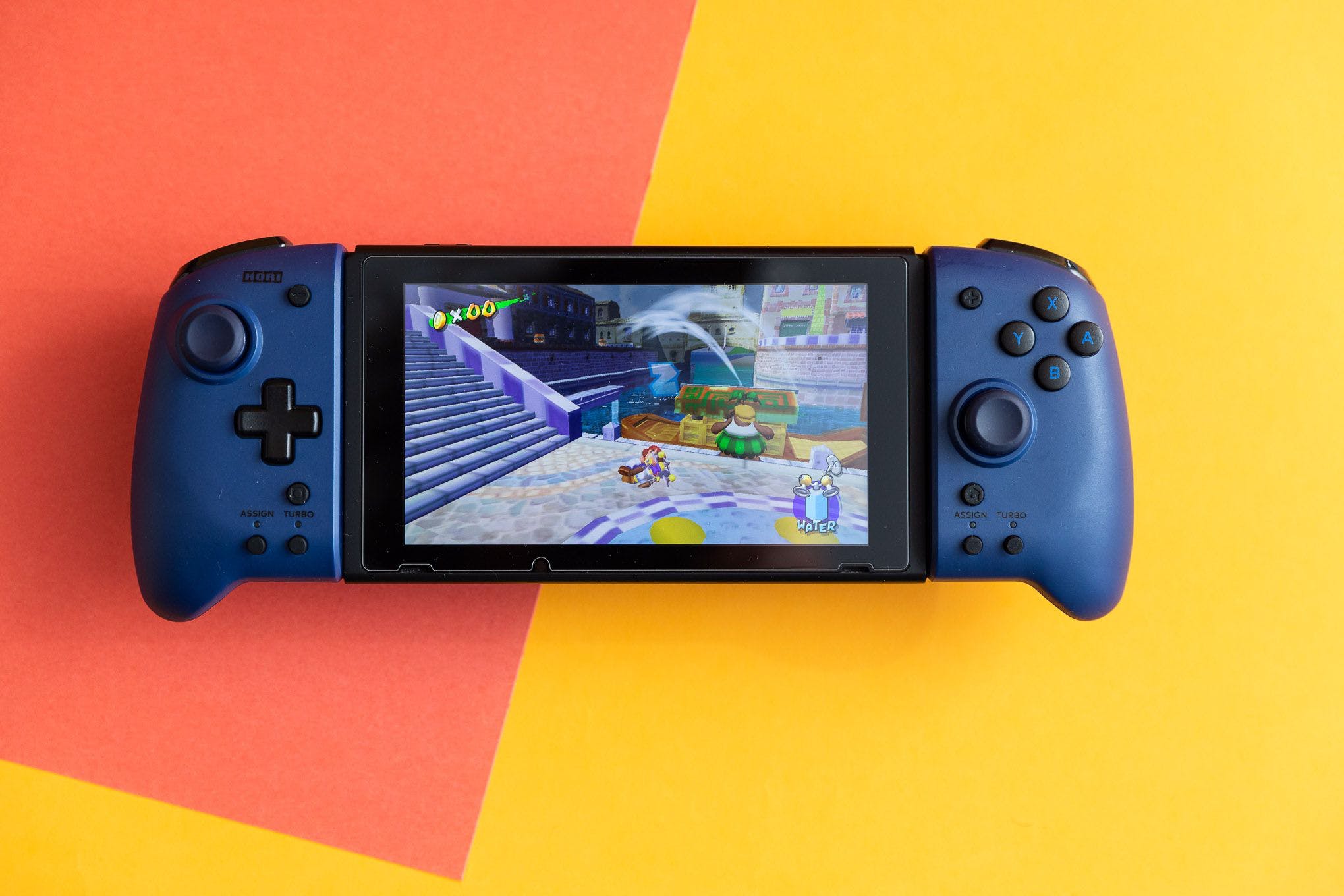 Hori’s Split Pad Pro are connected to a Nintendo Switch that is displaying Super Mario Sunshine.