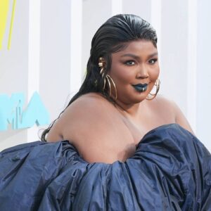 Lizzo breaks down in tears while accepting first Emmy Award - Music News