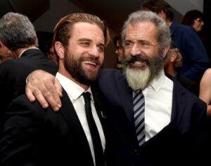 Milo and Mel Gibson at an after-party for a screening of