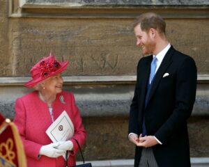 Queen Elizabeth II speaks with Prince Harry, as they leave after the wedding of Lady Gabriella Windsor to Thomas Kingston at St George's Chapel, Windsor Castle, on May 18, 2019.