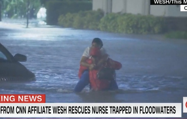 VIDEO: Reporter Tony Atkins Saves Woman From Hurricane Ian Floods