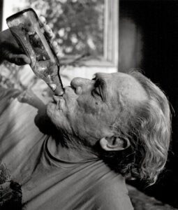Charles Bukowski drinking