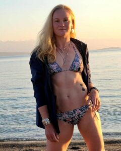 Valentina Shevchenko poses for the camera in her bikini.