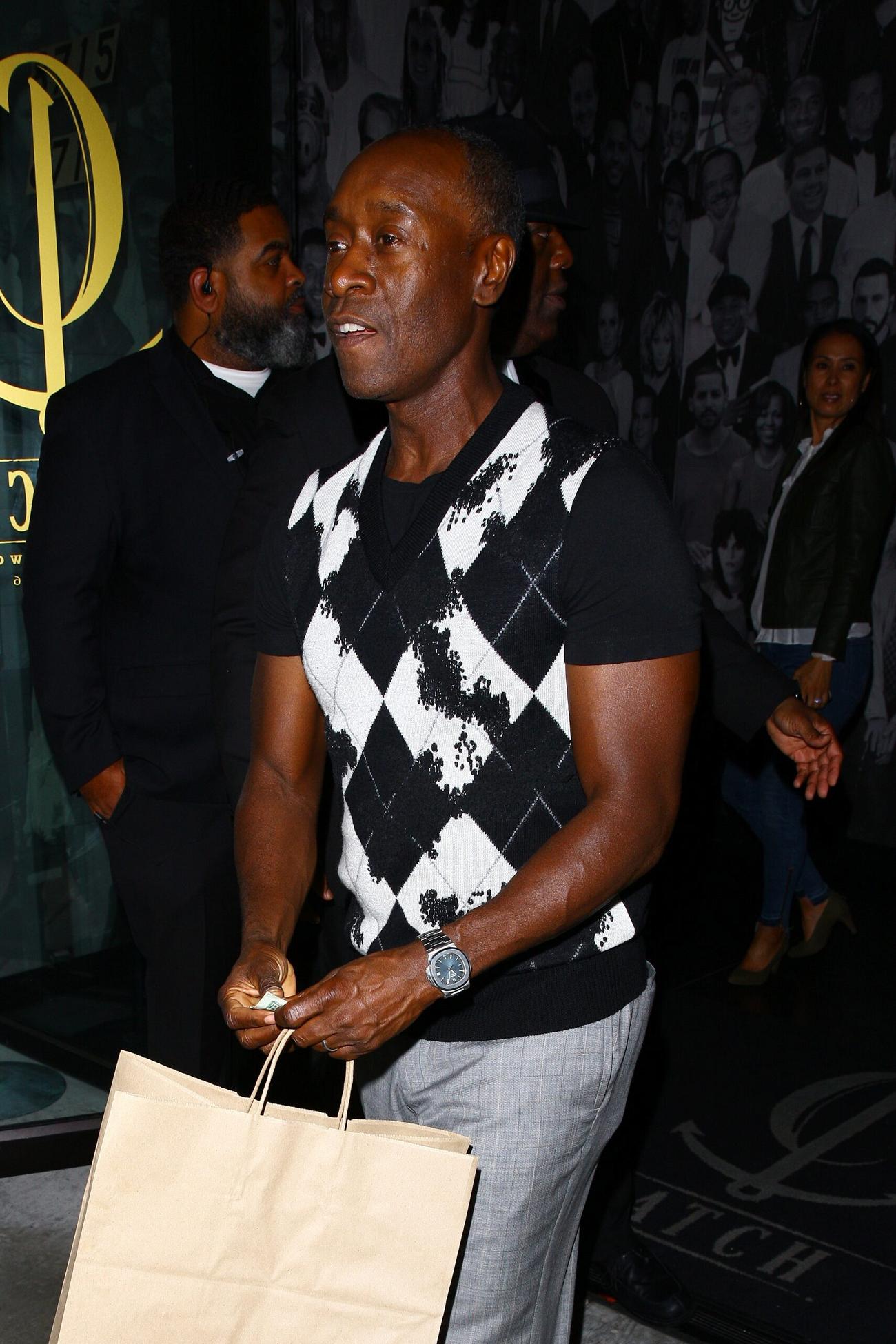 Actor Don Cheadle grabs his food to go from Catch LA restaurant