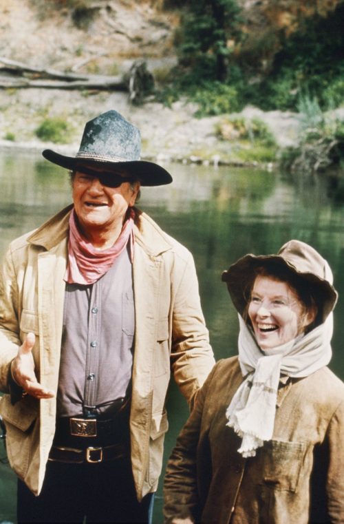 John Wayne and Katharine Hepburn on the set of 