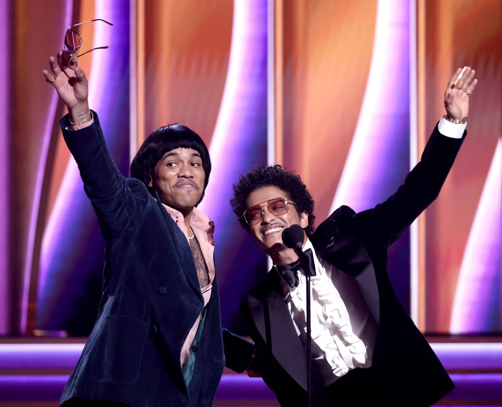 Anderson .Paak and Bruno Mars of Silk Sonic accept Record Of The Year award for ‘Leave The Door Open’ onstage during the 64th Annual GRAMMY Awards at MGM Grand Garden Arena on April 03, 2022 in Las Vegas, Nevada.