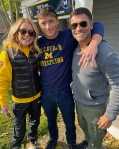 Kelly Ripa and Mark Consuelos' youngest son, Joaquin, towered over the both of them, in a rare photo posted by the talk show host