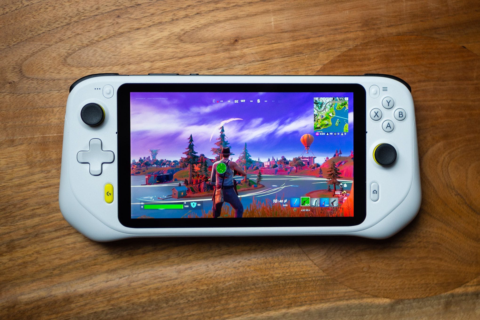 The Logitech G Cloud Gaming Handheld is shown running Fortnite over the cloud.