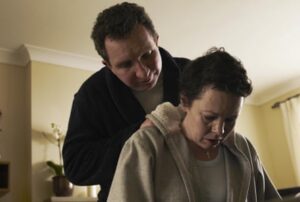 Marsan as James, the abusive husband, with his wife, Hannah (Olivia Colman), in the 2011 film Tyrannosaur.