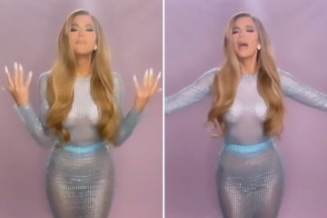 Khloe bares all in see-through dress & sings about 'lying in bed on her own'