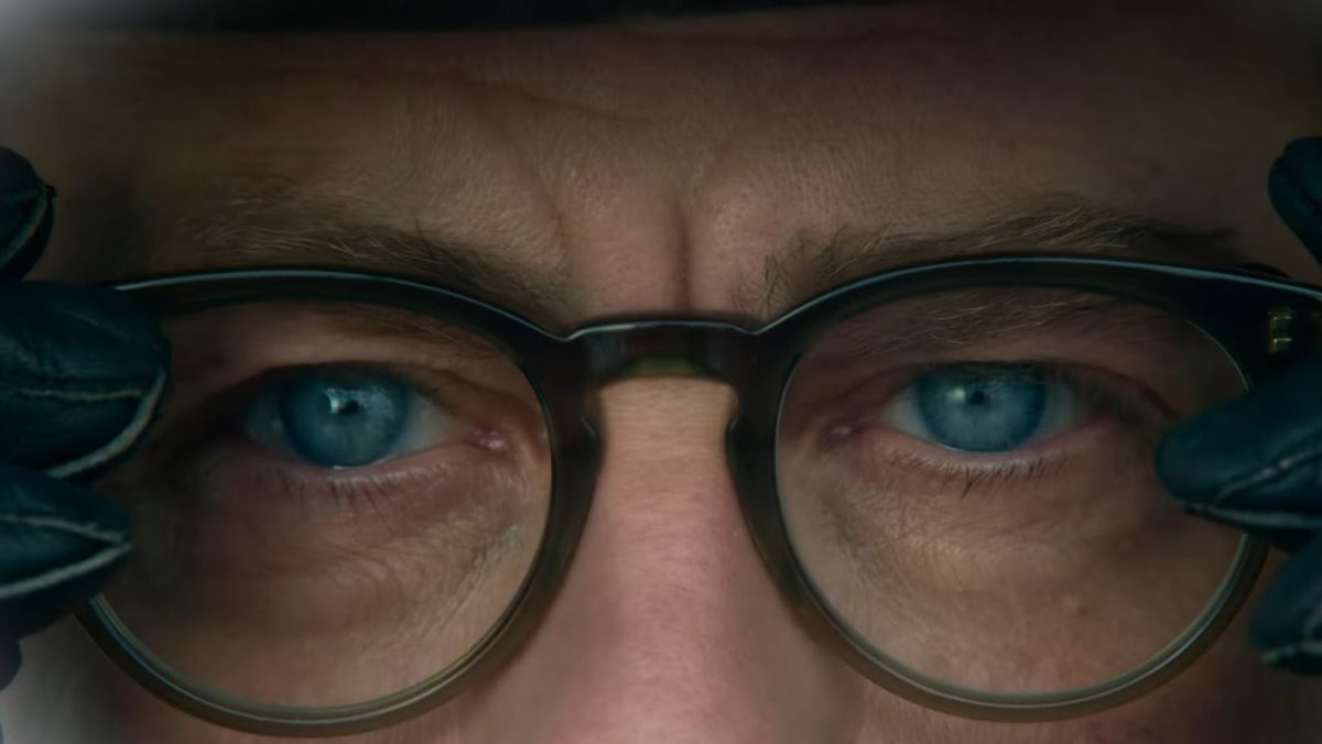 close up photo of ralphie putting on round glasses in a christmas story christmas sequel trailer