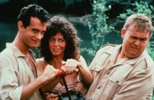 (L-R): Tom Hanks, Rita Wilson, and John Candy in a still frame from the movie "Volunteers"