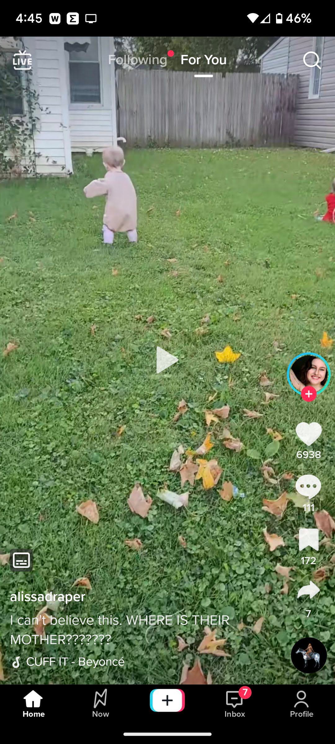 TikTok screen showing baby on lawn