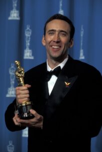 Cage with his Best Actor trophy at the Academy Awards in 1996.