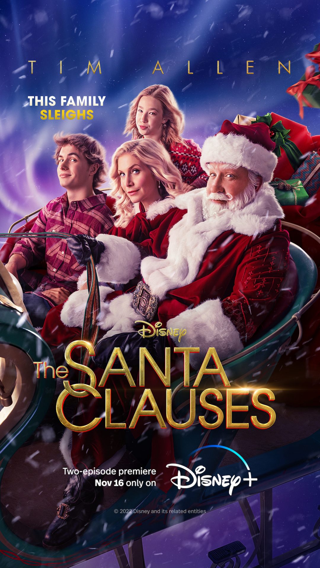 The Claus family in a sleigh on the poster for The Santa Clauses