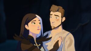 Claudia looks up at her father, concerned; her father Viren looks deeply tired
