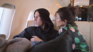 Kourtney Kardashian held husband Travis Barker tight and said a prayer for the two before taking off