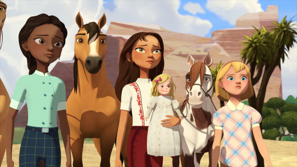 three girls and their horses