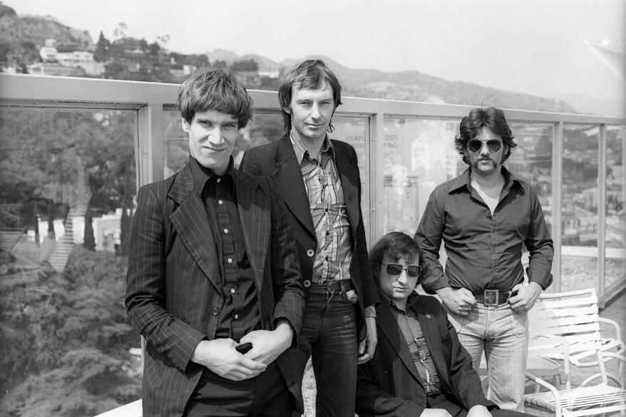 Guitarist Wilko Johnson, singer Lee Brilleaux, drummer John 'The Big Figure' Martin and bassist John B. Sparks of the English R&B group Dr. Feelgood pose for a portrait on March 23, 1976 in Los Angeles, California.
