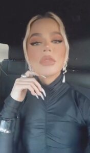 Khloe Kardashian poses in car selfie