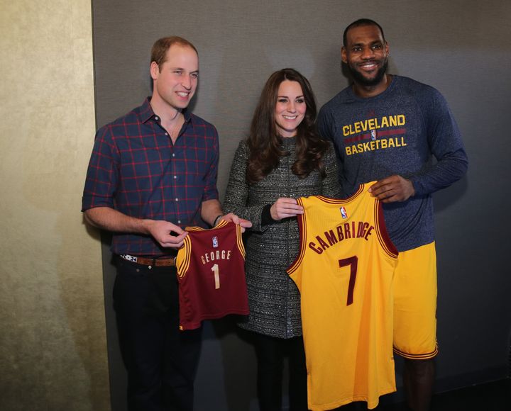 The then-Duke and Duchess of Cambridge with basketball player LeBron James backstage after the Cleveland Cavaliers played the Brooklyn Nets game on Dec. 8, 2014, in New York City.