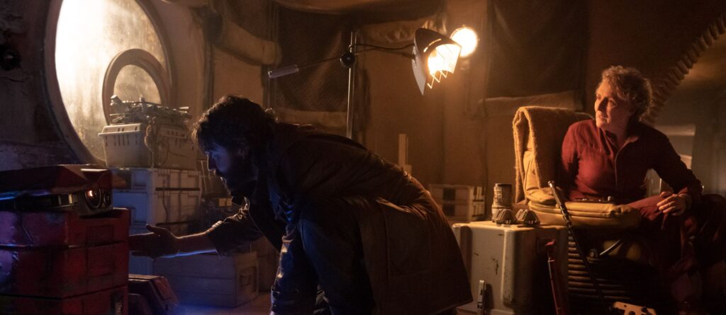 A photo of Diego Luna and Fiona Shaw in Maarva’s home in the Star Wars show Andor.