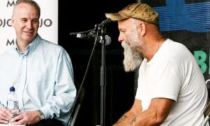 Colin Irwin, left, interviewing the US blues musician Seasick Steve at the Cambridge folk festival, 2010